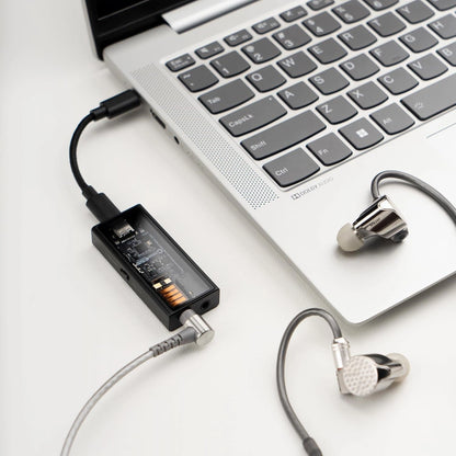 Black Questyle M15i transparent DAC/amp, connected to laptop and IEMs